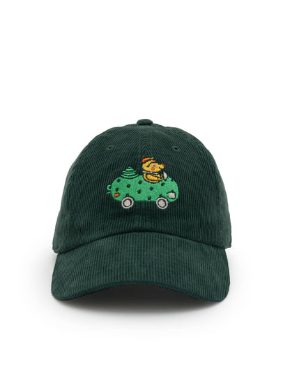 Green cap with a embroidered design on a white background