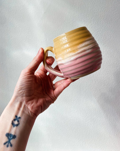 Pink and yellow mug
