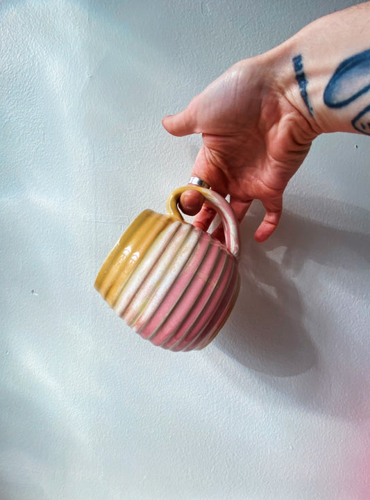 Pink and yellow mug